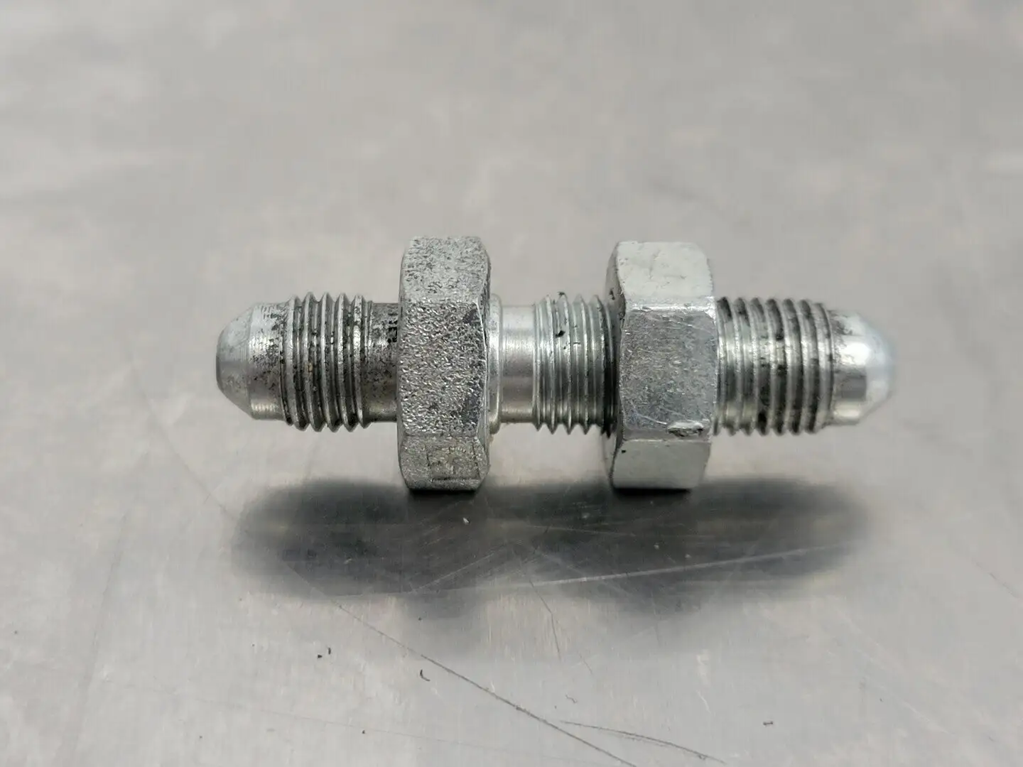 Hydraulic Bulkhead Adapter M-04 JIC X M-04 JIC 1/4" x 1/4" (Bag of 11)