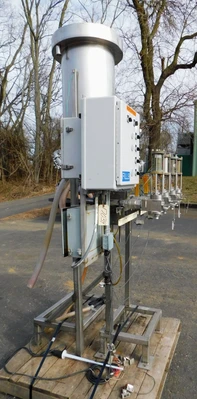 USED FOUR STATION VOLUMETIRIC FILLER FOUR STATION