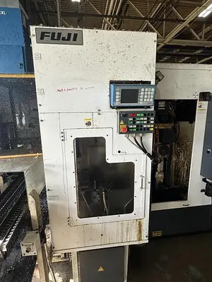 Used 2013 FUJI ANW 35 TWIN TURRET CNC LATHE, TAIL STOCK WITH ROBOT LOAD/UNLOAD AND STOCKER TABLES CNC Lathes | Harbor Machinery Inc. #1283394