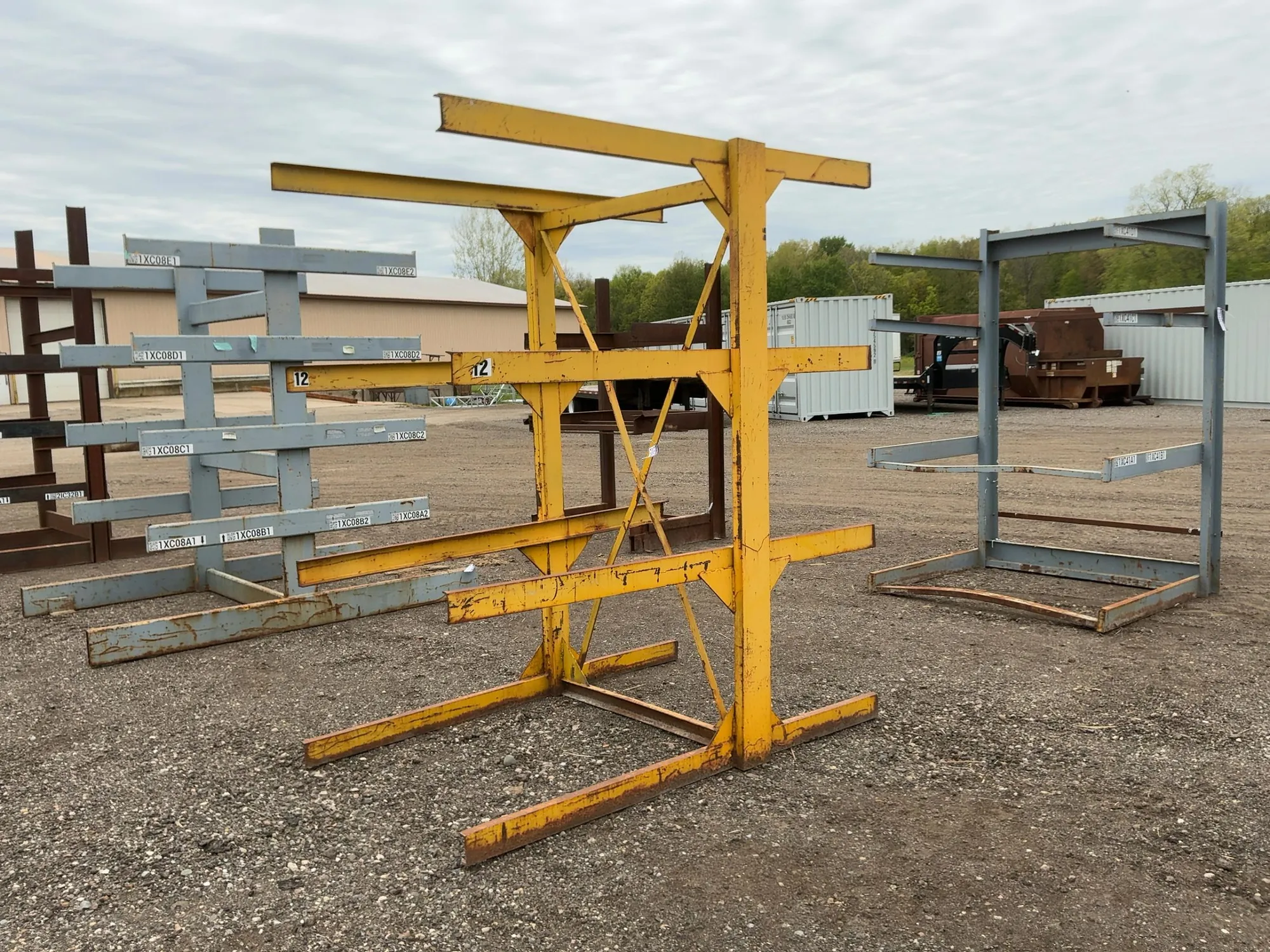 Metal Two Sided Cantilever Rack, welded together, arms stick out 47” on one side and 27-1/2” on othe...