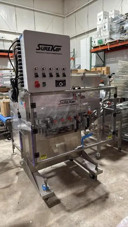 Used SUREKAP MODEL SK8000-BF6-70 AUTOMATIC SPINDLE CAPPER SUREKAP MODEL SK8000-BF6-70 AUTOMATIC SPINDLE CAPPER Cappers Illinois US | Save on Equipment #453463
