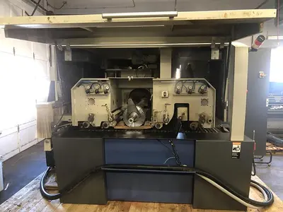 USED WEINIG RAIMANN PROFIRIP KR-310-2M GANG RIPSAW WITH (2) MOVING BLADES