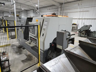 Hyundai SKT-300 CNC Lathe w/ Tailstock and Indexer, 10 Slot Turret, LNS Conveyor, 3-Jaw Chuck, Fanuc