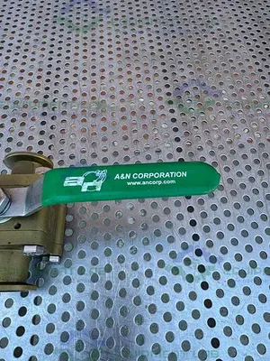 USED A&N CORPORATION C1100-QF25 BRASS BALL VALVE 1X10-8 TORR W/ 1 1/2" SANITARY FITTING