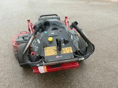 USED EXMARK TURF TRACER 60”