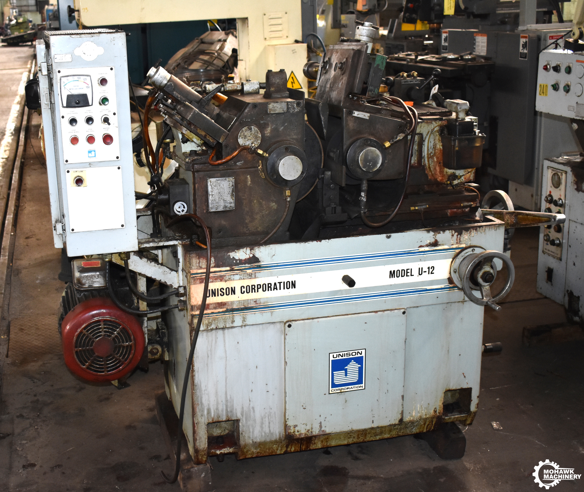 U12 UNISON "HIGH-PRODUCTION" CENTERLESS GRINDER w/THRUFEED WORKREST - HYDRAULIC WHEEL TRUING - COOLANT SYSTEM