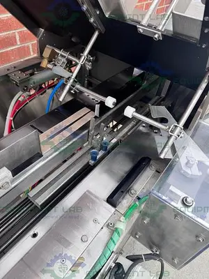 USED ECONOSEAL E SYSTEM 2000 ECONOSEAL CARTONER W/  HOT GLUE SEALING