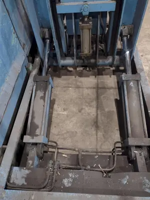20,000 LBS X 54" X 36" BRANER HYDRAULIC COIL CAR UPENDER WITH POWER FEED CONVEYOR: YOBRO #25238