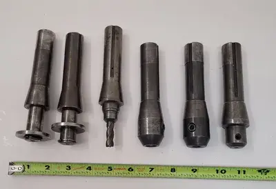 UNBRANDED R8 TOOL HOLDERS, SET OF 6, INCLUDING 1/4IN, 3/8IN, 1/2IN, AND 3/4IN SIZES.
