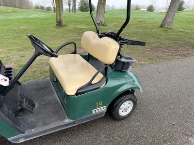 (1) 2015 E-Z-Go golf cart with a Kawasaki gas engine, includes club and ball washer, does not includ...