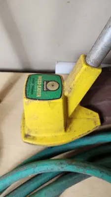 Garden Tools and Equipment including Weed Eater Grass Trimmer, Hose, and Accessories