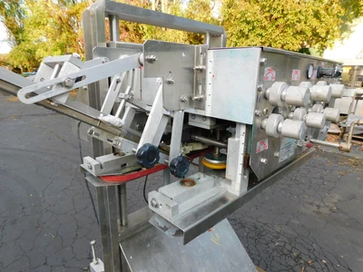 USED ELF AUTOMATIC CAPPER ACT 600
