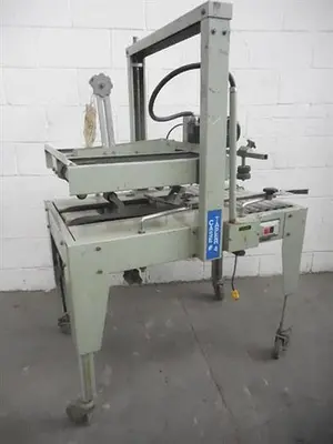 TOP and BOTTOM CARTON SEALER and TAPER