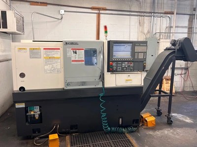 2015 OKUMA GENOS L250E CNC Lathes | PM Machines (1)