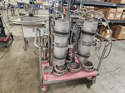 USED 1900 ACCUTEK/CHADAM 2 HEAD GRAVITY FILLER