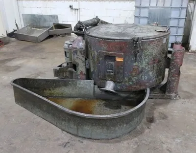 (2) Tolhurst 40" Center-Slung chip wringers.