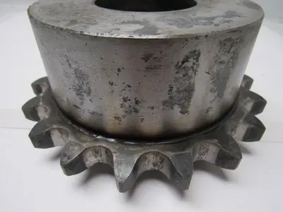 18 Tooth  100 Chain  2-3/4" Smooth Bore W/ built in Locking collar