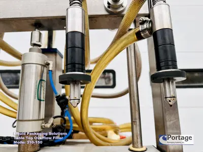 USED 2010 LIQUID PACKAGING 310-150 TT OVERFLOW FILLER