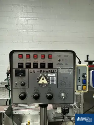 USED CLI Charles Lapierre Wrap Around Uni-Pharma Labeler, model UNI-500