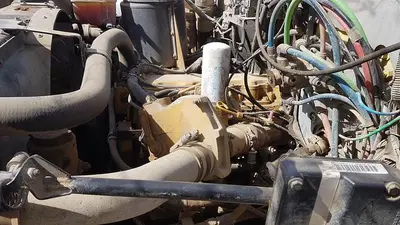 USED 2000 GMC C8500 TANDEM AXLE BED TRUCK