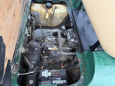 (1) 2015 E-Z-Go golf cart with a Kawasaki gas engine, includes canopy, ball cover, club cover, fold-...
