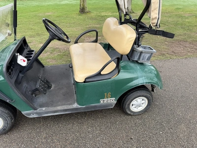 (1) 2015 E-Z-Go golf cart with a Kawasaki gas engine, includes ball washer and Club canopy, ball cov...