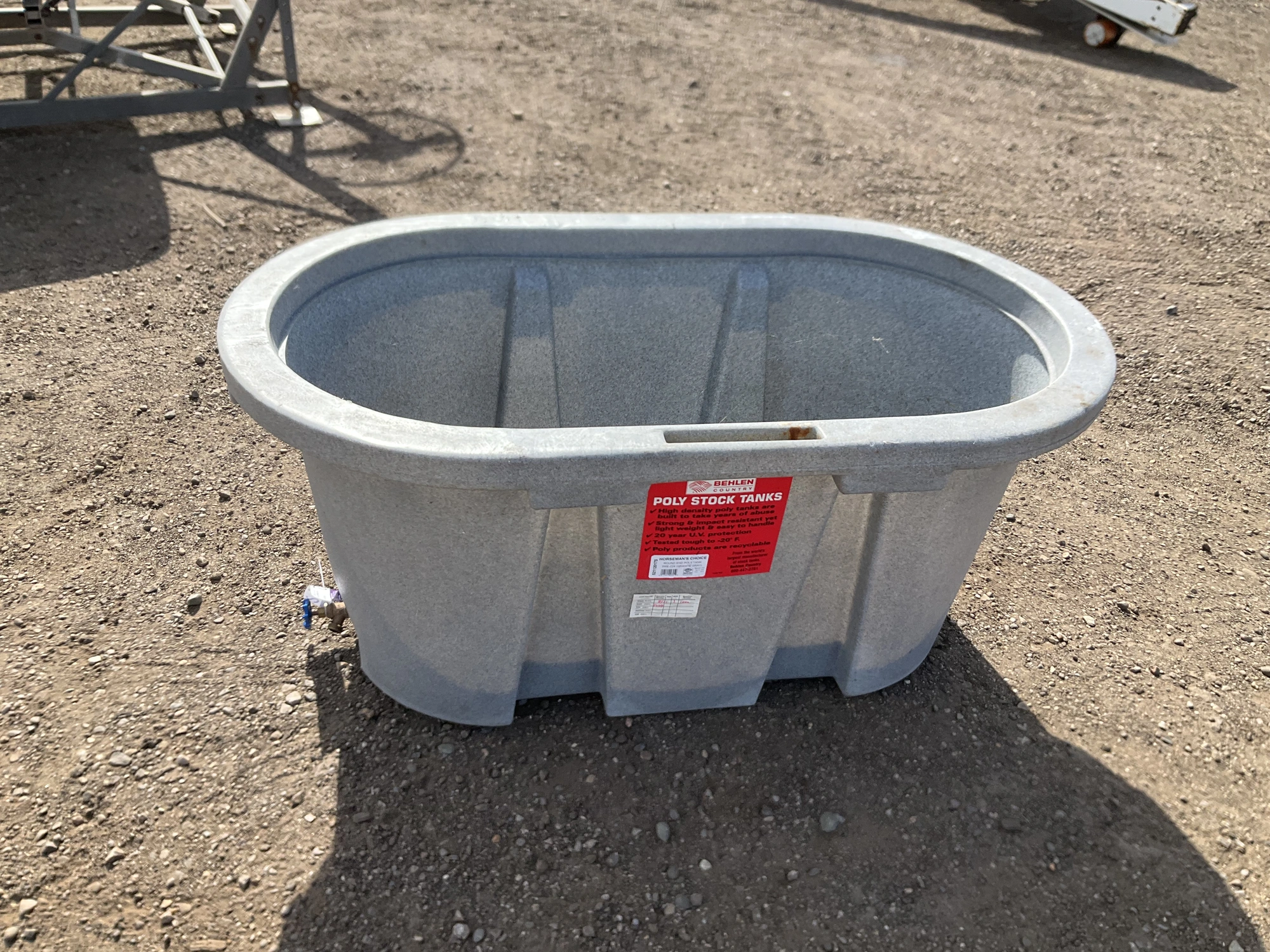 Behlen Country 100 gallon poly stock tank, approx 4’ x 2’ x 2’, drain valve on one end