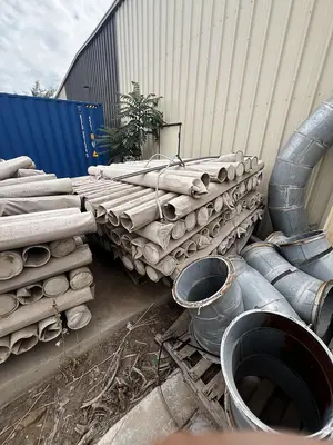 Air conveying scrap system with 100's of feet of piping