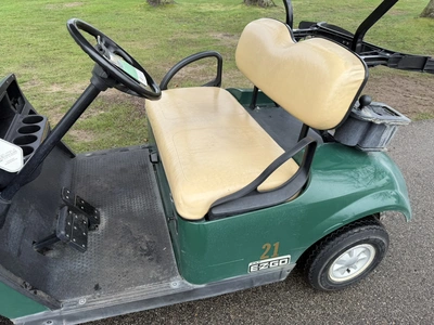 (1) 2015 E-Z-Go golf cart with a Kawasaki gas engine, includes Club Clear club and ball washer, Club...