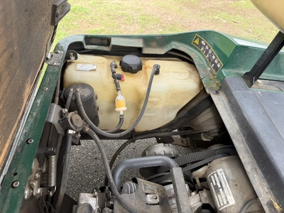 (1) 2015 E-Z-Go golf cart with a Kawasaki gas engine, includes Club canopy and ball washer, fold-dow...