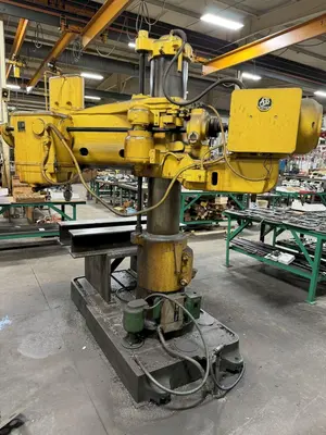 3' X 11" CARLTON RADIAL ARM DRILL. STOCK # 1113924.