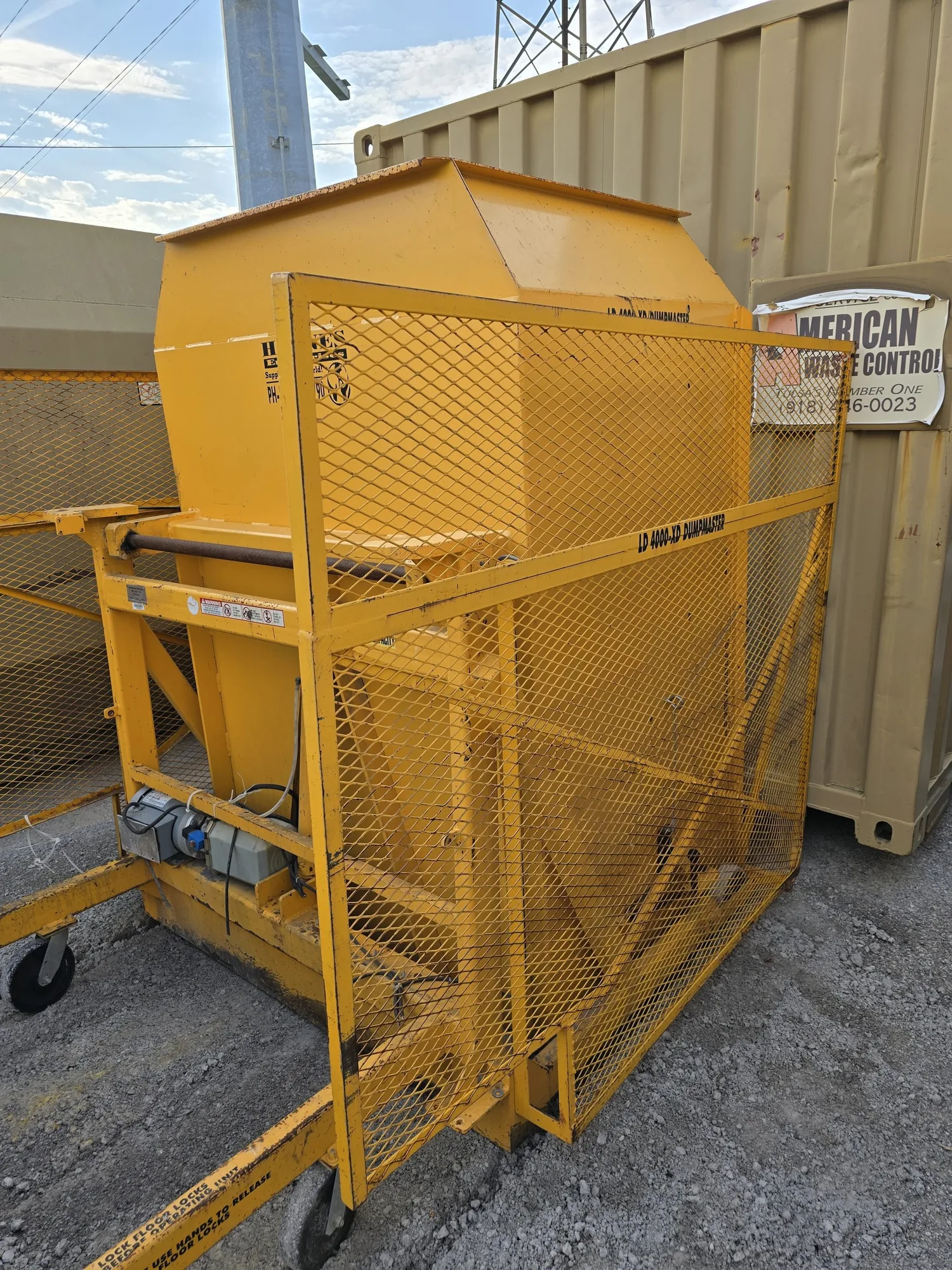 4,000 lb. Capacity DumpMaster Box Dumper with  a 2 HP Motor.