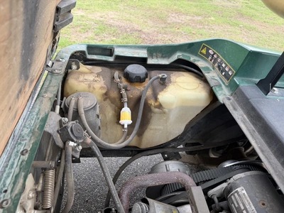 (1) 2015 E-Z-Go golf cart with a Kawasaki gas engine, includes Club Clear club and ball washer, does...