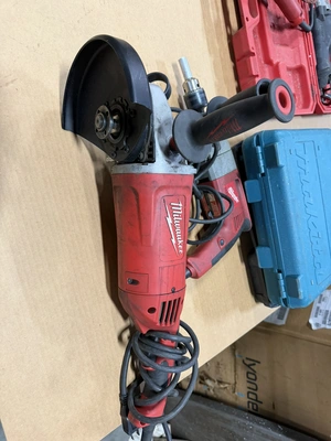 Lot of Milwaukee power tools, includes (1) Cat #6088-30, 120V, 6600 RPM, 7" / 9" grinder, and (1) Ca...