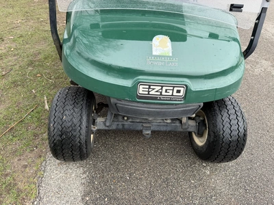 (1) 2015 E-Z-Go golf cart with a Kawasaki gas engine, does not include Club canopy, includes ball wa...