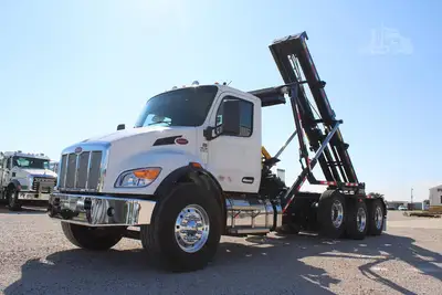 New | in-Stock 2027 PETERBILT 548 Rolloff Trucks Texas US | Roll Off Truck World #1492018