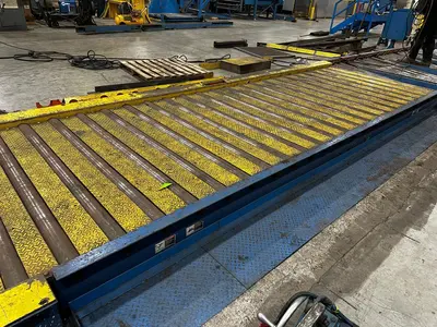 51' Powered Floor Mounted Exit Conveyor