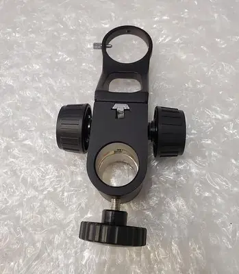 MICROSCOPE FOCUSING MOUNT