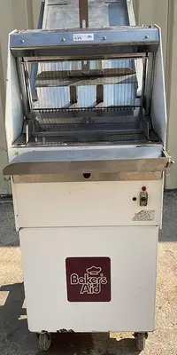 USED BAKERS AID BREAD SLICER GRAVITY FED