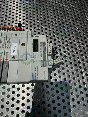 USED SMC EX140-SDN1 INTERFACE SERIAL UNIT W/ LOT OF 8 SMC SQ1A31Y-5-N7 SOLENOID VALVE
