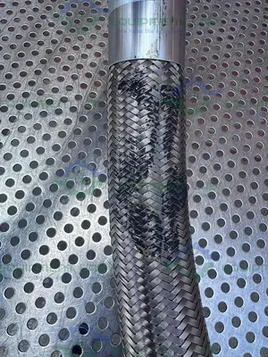 USED HARRINGTON STAINLESS STEEL BRAIDED HOSE 15" W/ 1 1/2" SANITARY FITTING