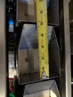 Flow Packer with Bucket Infeed