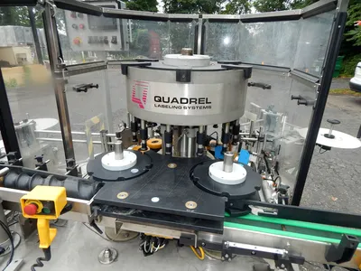USED QUADREL DUAL SIDE LABELER ROTARY