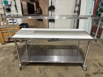 Used John Boos Used John Boos 36"x72" Stainless Table with Overshelf, Casters and Cutting Board Food Prep Tables Illinois US | Falcon Restaurant Supply #1375674