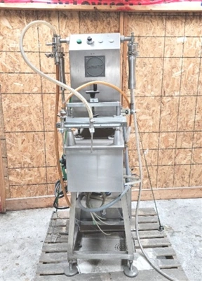 Capmatic Model CF-2P Tabletop Semi-Automatic Filler