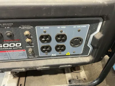 USED PREDATOR 4000 WATT MAX GAS GENERATOR WITH WHEEL KIT