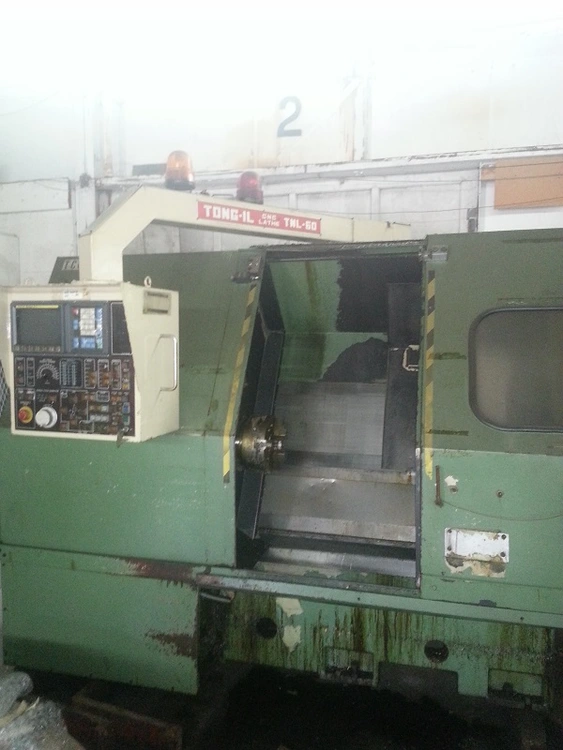 Used 1992 TONG-IL TNL-60 CNC Lathes | Two Spade Machinery LLC #508251