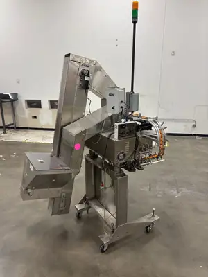 USED SUREKAP SK6000 CAPPER AND ELEVATOR