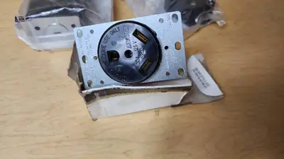 Leviton Electrical Components including 30/50 Amp Dual Power Plug, 50A Surface Mount Power Outlet, and Vehicle Use Outlet