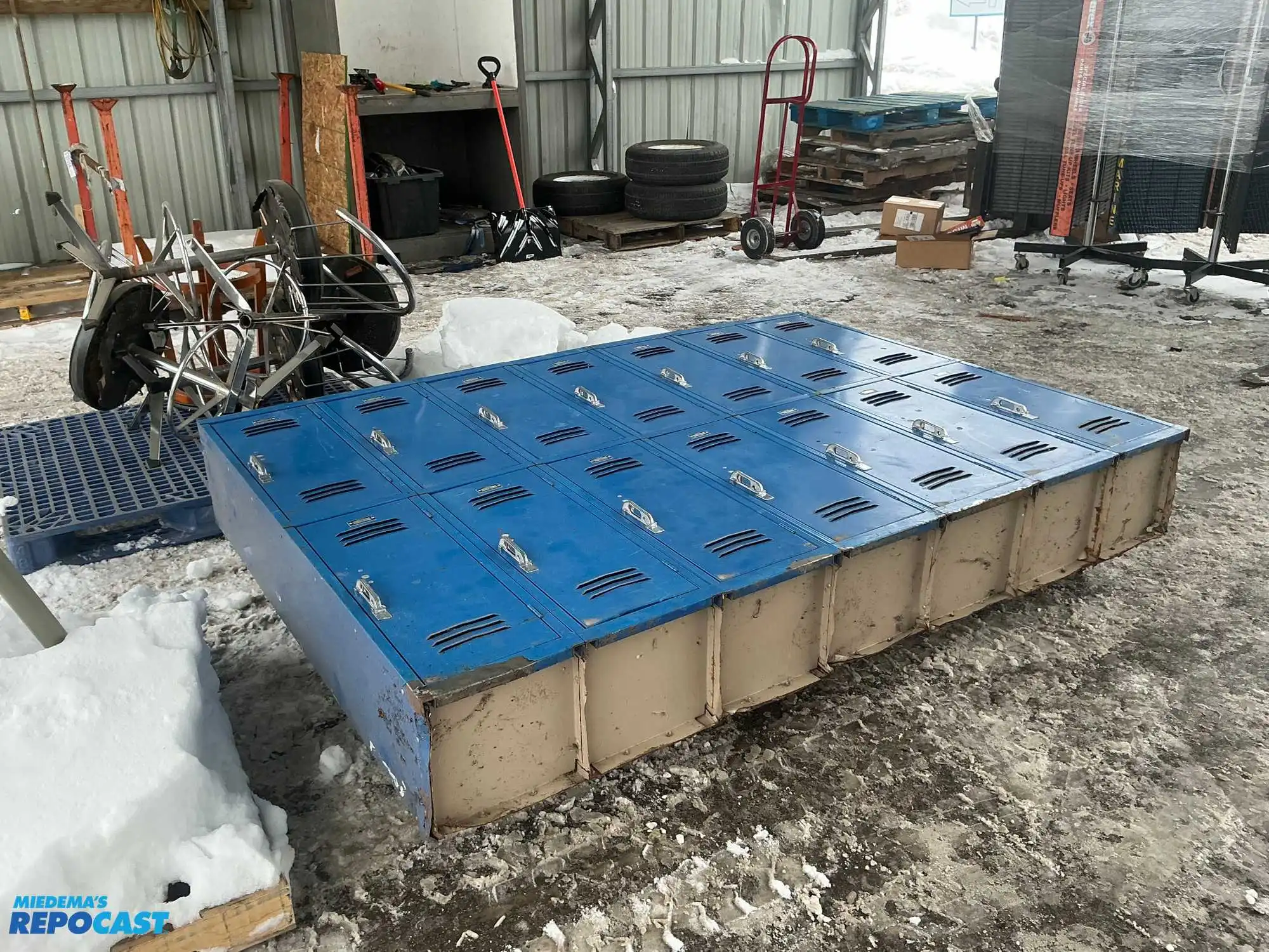 14 door blue metal locker unit 60”x84” (each one is approximately 10”24”x10”)